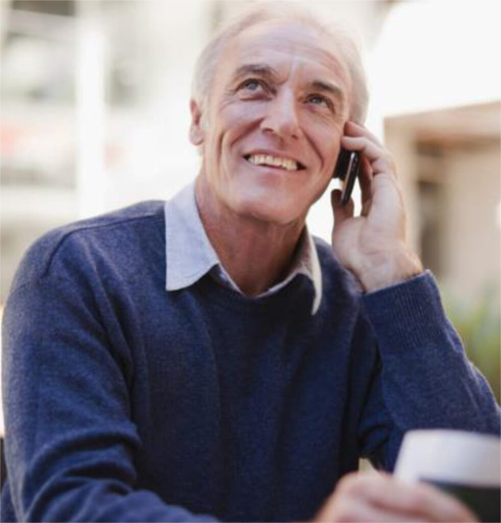 image of man talking on phone